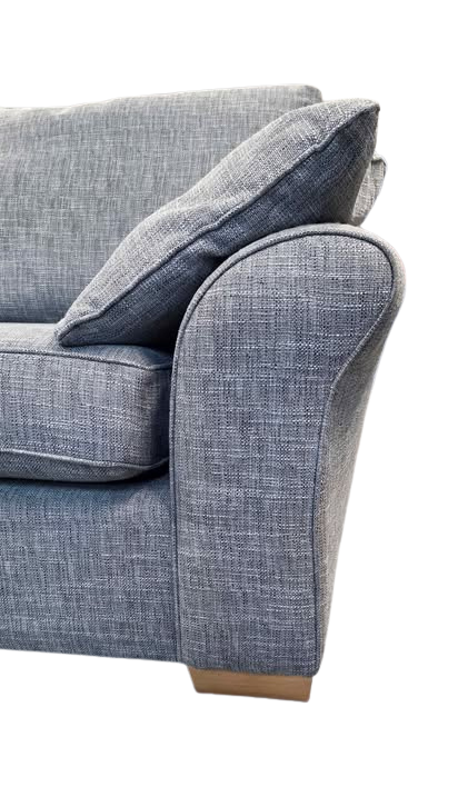 Gray sofa with a cushion on a white background